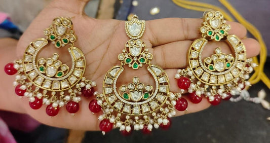 Grand Kundan Chandbali Earrings with Red Beads and Green Accents